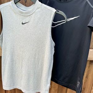2 boys large Nike shirts